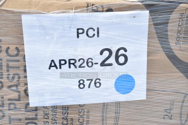 Pallet with assorted scratch and dent items, including tabletops and containers, labeled "PCI APR26-26."