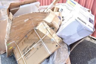 New scratch and dent items in damaged boxes, including souffle cups, stock pot, portion cups, food wrap, colander.