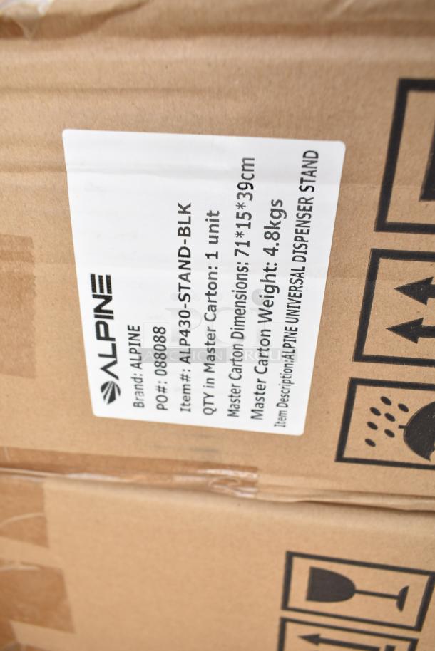 9 brand new in box Alpine ALP430-STAND-BLK universal sanitizer and soap dispenser stands. Box label shows model and dimensions.