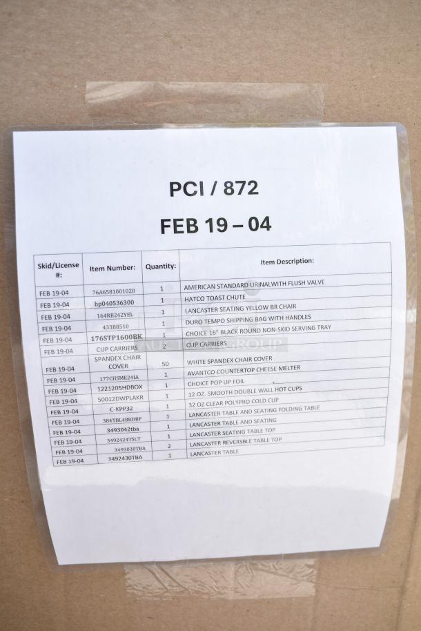 Label on cardboard with auction lot details, listing 16 new "scratch and dent" items including flush valve, toast chute, and furniture.