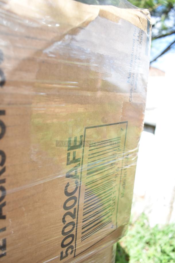 Box of 34 new scratch and dent items including hot cups. Visible barcode and label with manufacturing details.