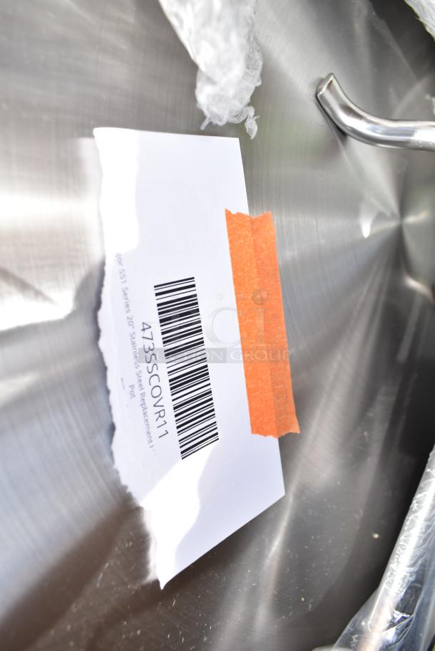 Barcode on a stainless steel item labeled "473SSCOVR11," indicating a 20" replacement pot lid, scratch and dent condition.