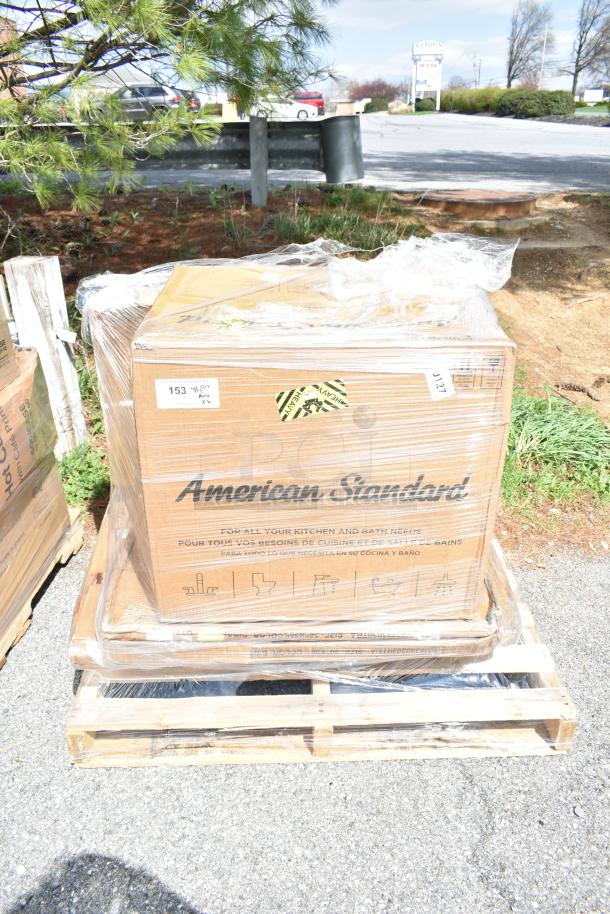 Pallet with boxed American Standard products marked "Heavy" and "New." Includes tabletops, wire shelf, and sink.