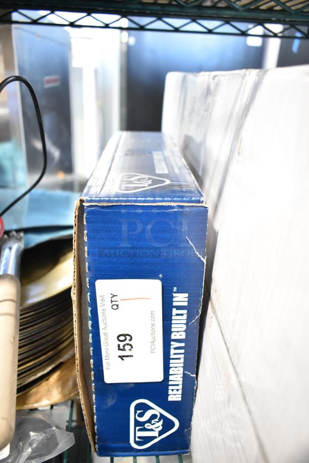 T&S B-1225 glass and pitcher filler, new with scratches, in original box. Features 6" swing nozzle, 1/2" NPT male inlet.