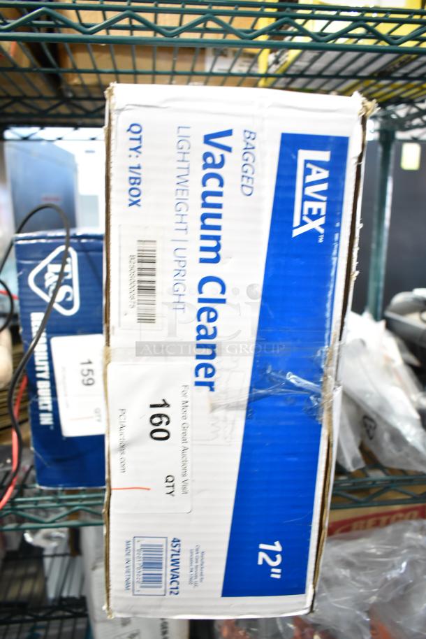 Lavex 12" Light Weight Upright Bagged Vacuum Cleaner, new, scratch and dent condition, model 457LWVAC12, visible box.