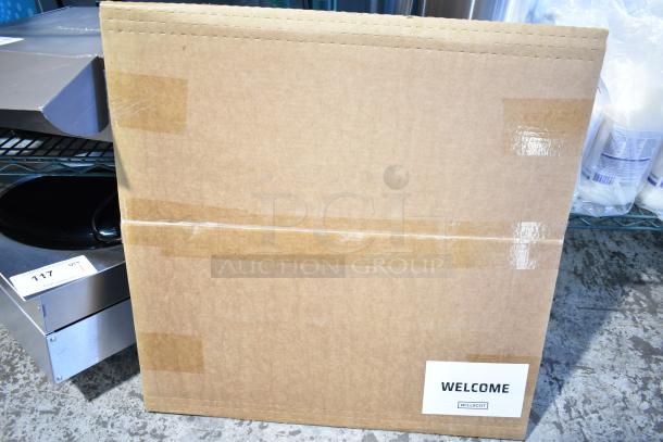 Eight new Willscot calendars in original packaging, scratch and dent condition. Welcome label visible on box.