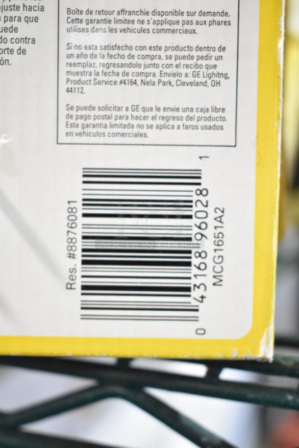 Alt text: Packaging detail of a high beam light, showing barcode, warranty information, and GE Lighting address.