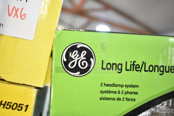 GE Long Life headlamp box, features 2 headlamp system. Visible brand logo. Box in good condition, marked with "vx6".
