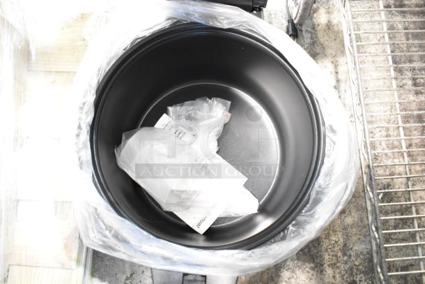 Brand new Galaxy 177RCSG60 rice cooker/warmer, 60-cup capacity. Includes manual and accessories, scratch and dent condition.