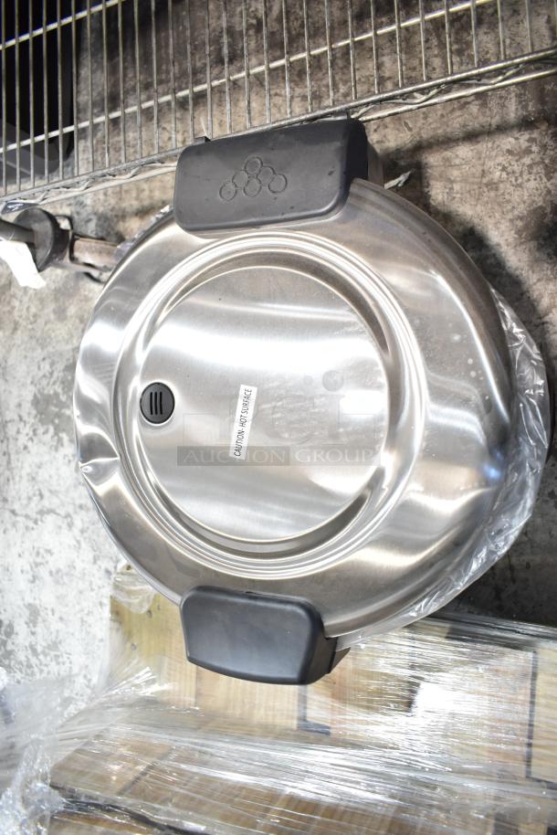 Brand new Galaxy 177RCSG60 60-cup countertop electric rice cooker. Scratch and dent model, 120V, 1 phase. "CAUTION: HOT SURFACE" label visible.