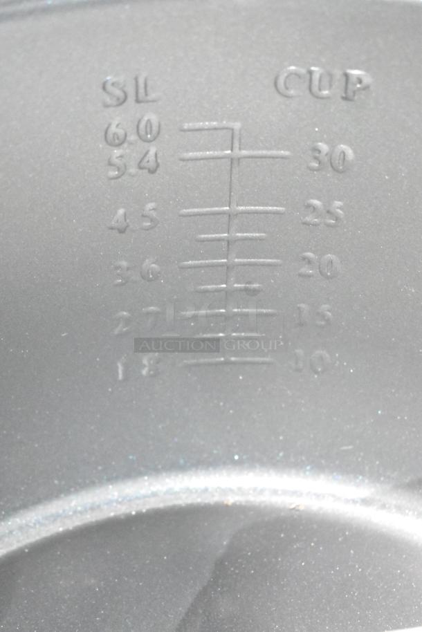 Galaxy 177RCSG60 electric rice cooker, 2024 model, 60-cup capacity. Features measurement markings inside. Brand new with slight dents.