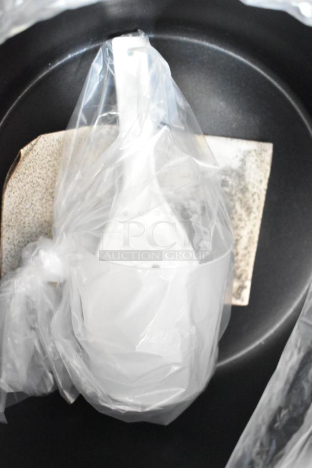 Brand new Galaxy 177RCSG60 countertop rice cooker, 60 cup capacity, in packaging. Includes spatula and measuring cup.