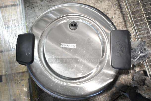 Brand new Galaxy 177RCSG60 60 Cup electric rice cooker/warmer, 120V, 1 Phase. "Caution: Hot Surface" label visible.