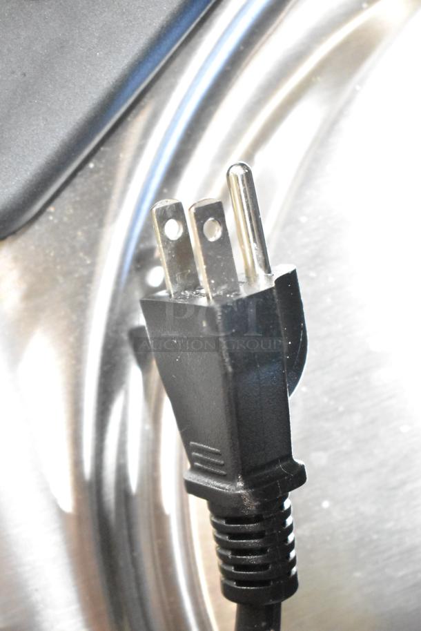 Close-up of power plug for Galaxy 177RCSG60 electric rice cooker, 120 volts, 60 cup capacity, new condition.