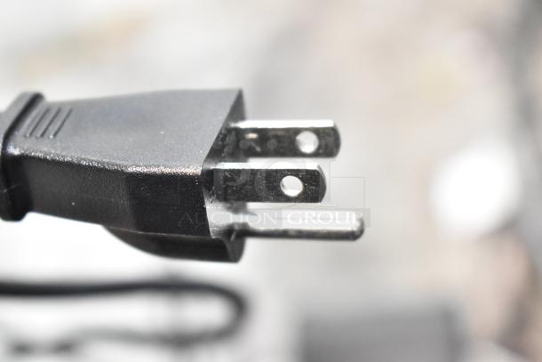 Close-up of a plug for the Galaxy 177RCSG60 electric rice cooker, 120 volts, 1 phase, countertop model.