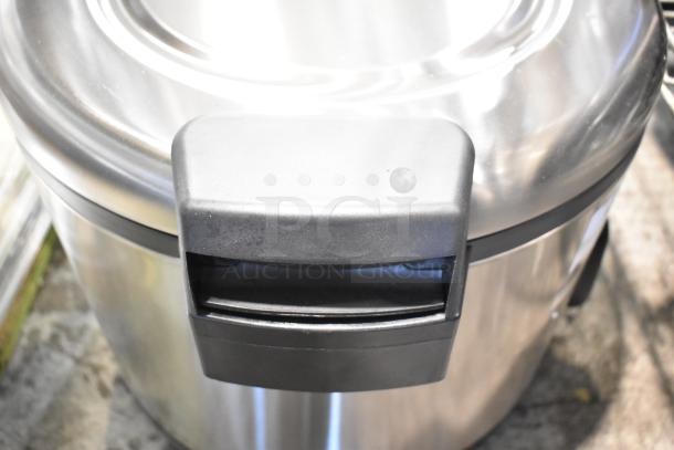 Brand new Galaxy 177RCSG60 countertop electric rice cooker, 60 cup capacity, stainless steel, minor scratches.