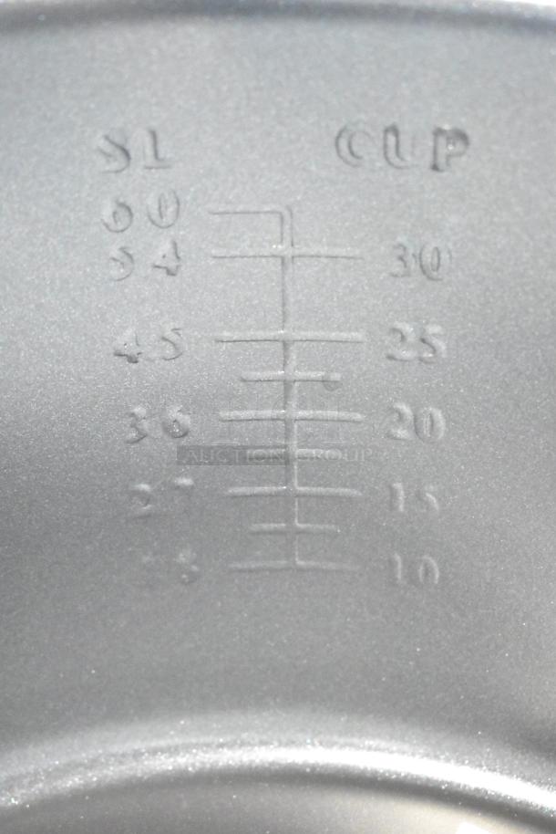 Inside view of Galaxy 177RCSG60 rice cooker showing cup measurement markings for 10 to 60 cups.