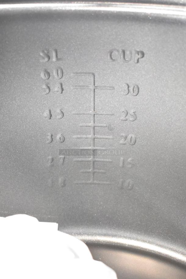 BRAND NEW Galaxy 177RCSG60 electric rice cooker interior with 60-cup measurement markings. 120V, 1 Phase.