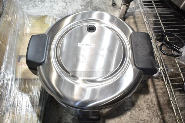 Brand new 2024 Galaxy 177RCSG60 countertop rice cooker/warmer, 60 cup capacity, stainless steel with black handles, 120 volts.