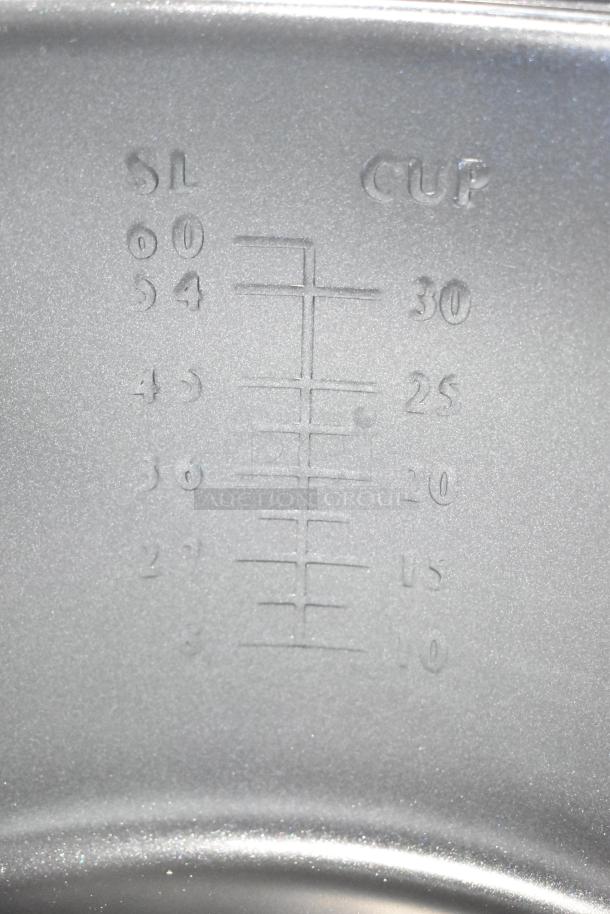 Brand new Galaxy 177RCSG60 electric rice cooker, 60 cup capacity. Interior markings show measurements in cups.