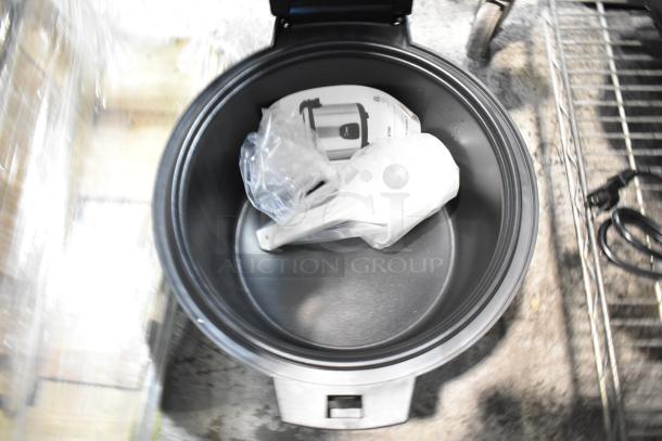 Brand new Galaxy 177RCSG60 60-cup electric rice cooker/warmer. Includes manual and accessories, 120 volts, 1 phase.