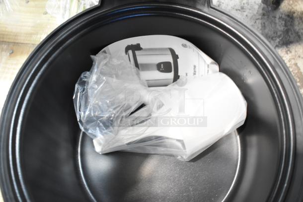 Brand new Galaxy 177RCSG60 electric rice cooker, 60 cup capacity. Unused, includes manual and accessories in packaging. 120V, 1 Phase.