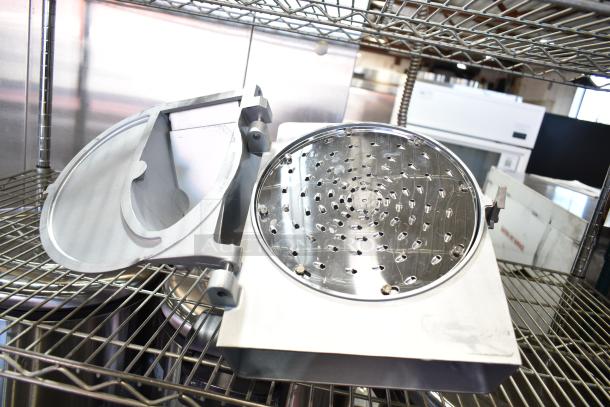 Commercial Pelican Head with grating blade, stainless steel, excellent condition, ideal for food processing.