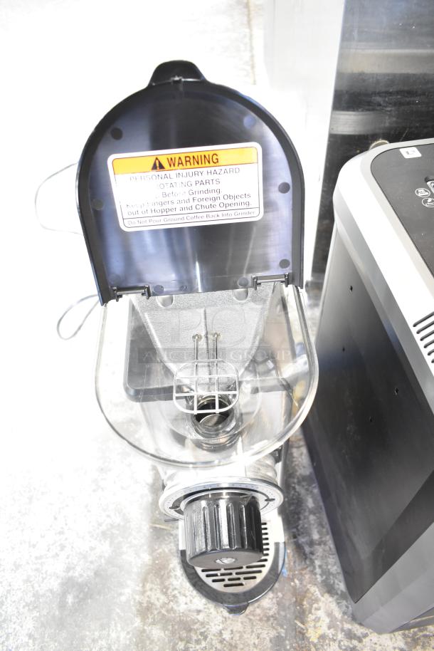 2025 Bunn GVH Commercial Coffee Bean Grinder, 120V, 1 Phase, open hopper with safety warning label visible, sleek design.
