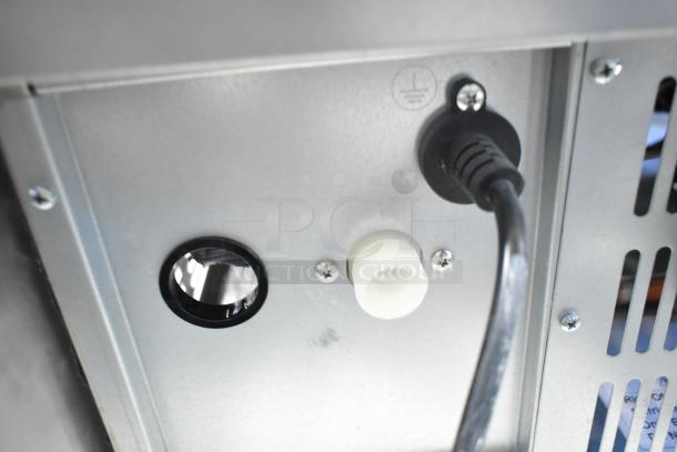 Rear panel of Avantco Commercial Self Contained Ice Machine, showing power cord and connection ports. Brand new, scratch and dent.