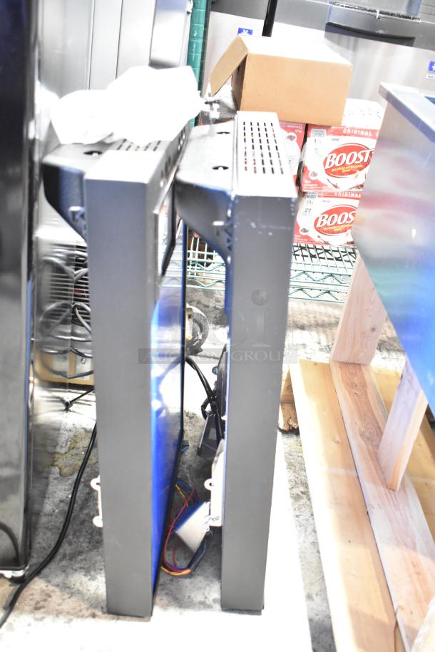 Two Cornelius 620046773X Merchandiser Kit Assemblies, short, 2 Flavor Viper models, appearing new, side by side in storage.