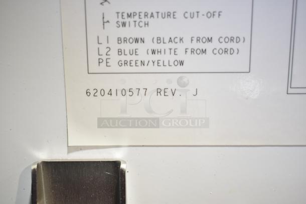 Label from Cornelius merchandiser kit, model 620410577 Rev. J, shows wiring and temperature cut-off instructions.