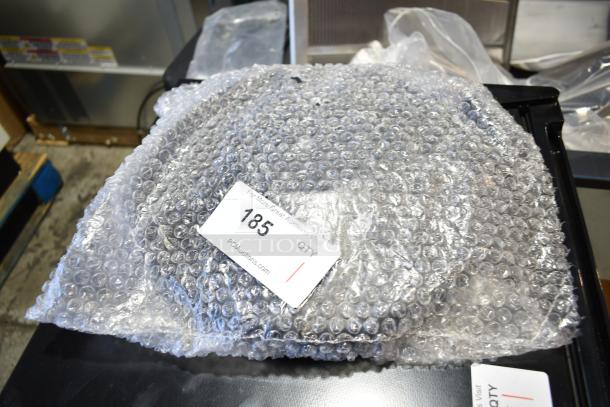 Lancaster Table & Seating 40" black stanchion base, new scratch and dent, in bubble wrap with auction label 185.