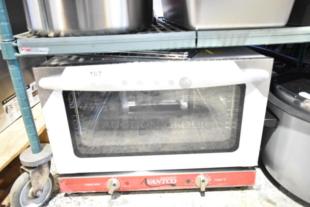 Brand new Avantco 177CO16 half-size countertop convection oven, 1.5 Cu. Ft., 120V, 1 Phase, shows minor scratches.