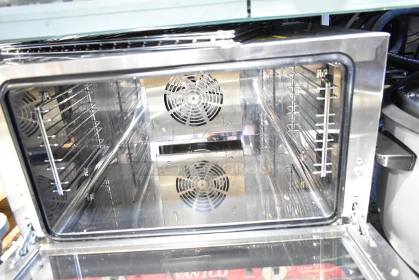 Brand new Avantco 177CO16 commercial countertop convection oven, 1.5 cu. ft., visible racks and fans, 120V, 1 phase.