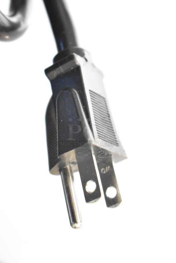 Close-up of a black power plug for the Avantco 177CO16 commercial countertop convection oven.