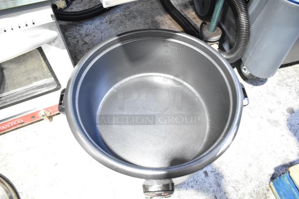 Brand new Avantco 177RCB124 rice cooker, 124 cup capacity, slight scratches, removable lid, electric, 240V, 1 phase.