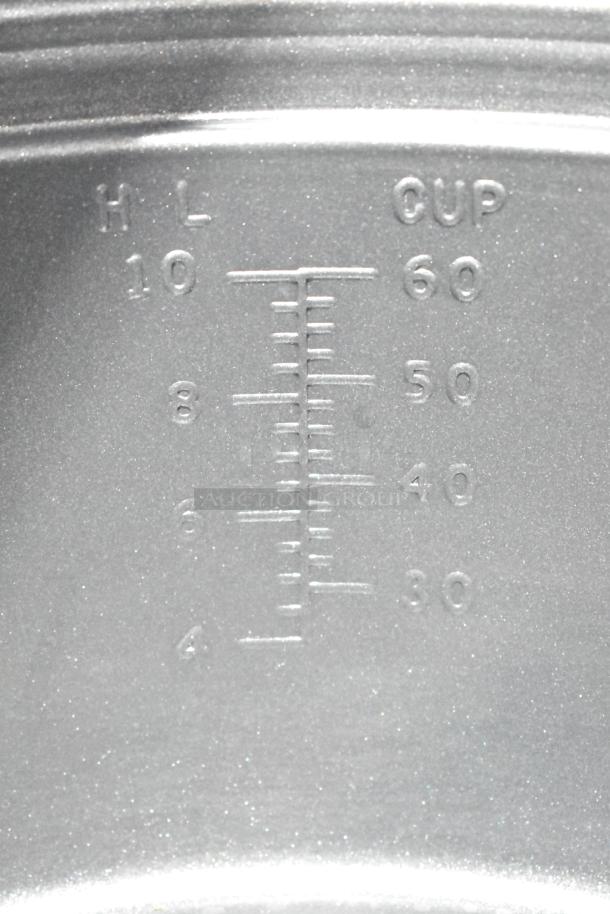 Avantco 177RCB124 rice cooker interior with cup capacity markings visible, indicating up to 60 cups.