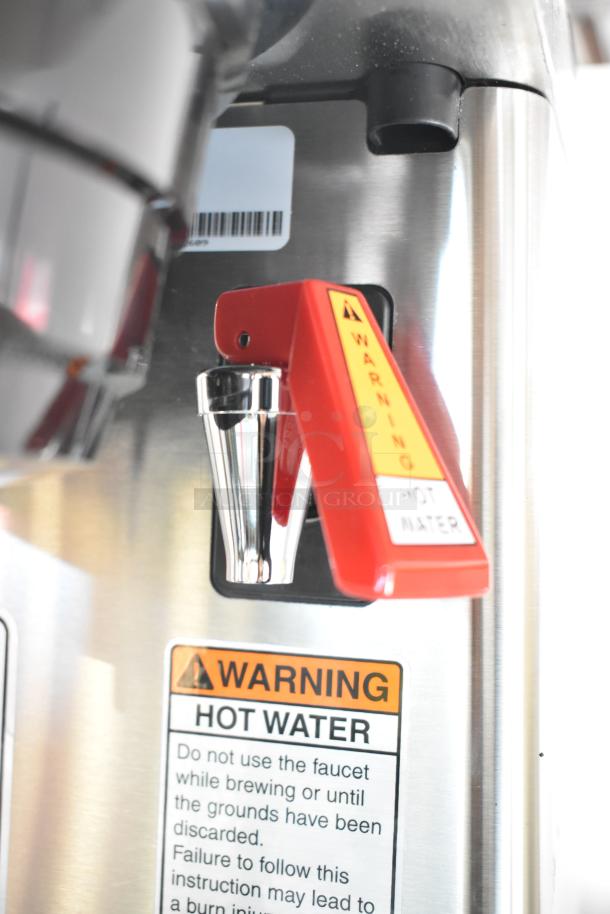 Bunn 39900.0006 SmartWAVE coffee brewer, new condition with scratch and dent. Features safety hot water warning.