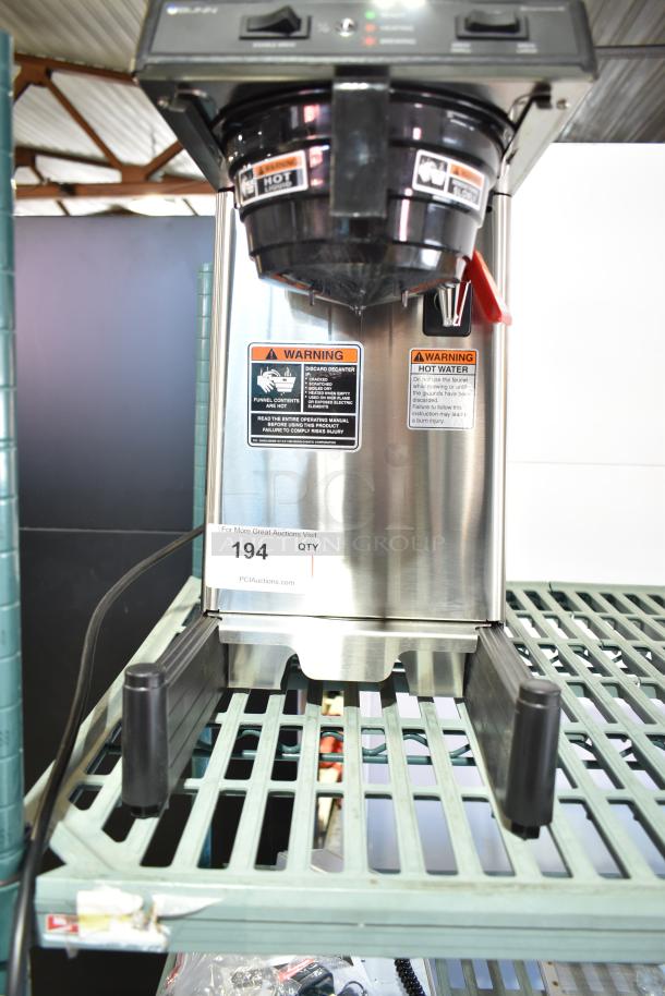 Brand new Bunn 39900.0006 SmartWAVE coffee brewer, low profile, automatic, 120V, with warning labels, minor scratches.