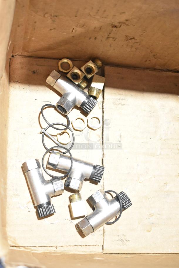 8 metal fittings and connectors, including 020237-45 power unit, in a box. Components appear in used condition.