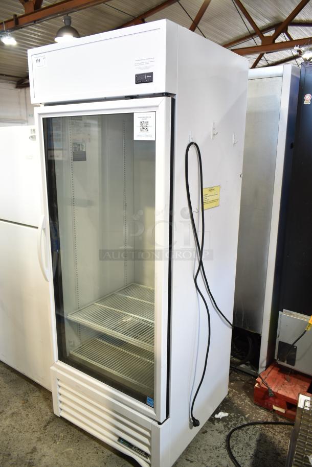 2021 True TSCI-600R-G-PH single door cooler merchandiser, 115 volts, 1 phase. Excellent condition, glass door, white exterior.