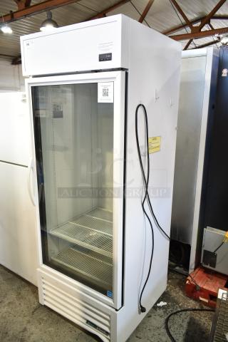 2021 True TSCI-600R-G-PH single door cooler merchandiser, 115 volts, 1 phase. Excellent condition, glass door, white exterior.