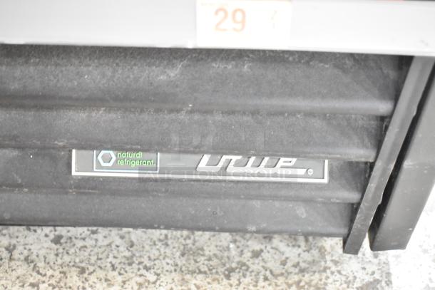 2020 True GDM-41SL-48-HC-LD commercial cooler with "natural refrigerant" label, in good condition.