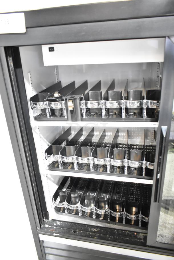 2020 True GDM-41SL-48-HC-LD commercial 2 door reach-in cooler merchandiser, excellent condition, shelving visible.