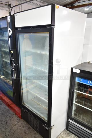 Habco SF28M Commercial Single Door Reach In Freezer Merchandiser, 115V, 1 Phase, with glass door and wire shelves.