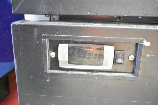 Habco SF28M reach-in freezer display panel, shows digital temperature control, power switch, slight wear visible.