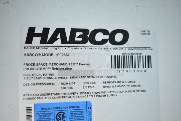 Habco SF28M Commercial Freezer tag showing model details, 115V, single phase, refrigeration specs, and safety instructions.