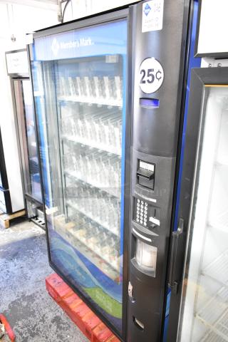 Crane 5800-4 metal vending machine for bottled drinks. Features bill acceptor, 115 volts, 1 phase. Visible 25¢ marking.