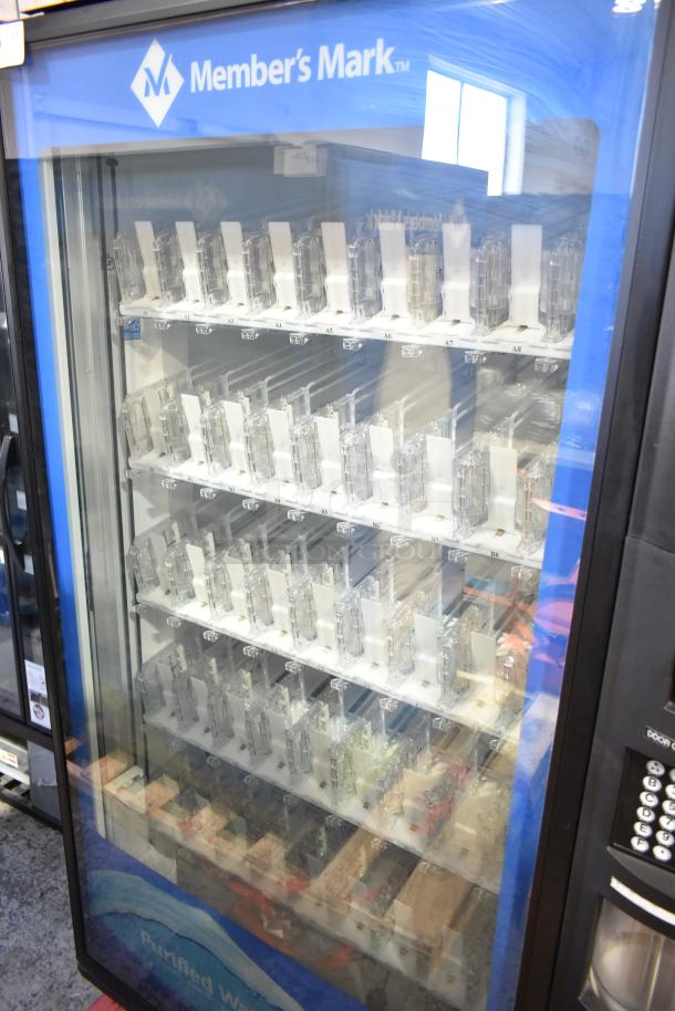 Crane 5800-4 metal bottled drink vending machine with bill acceptor, 115 volts, visible Member's Mark branding.
