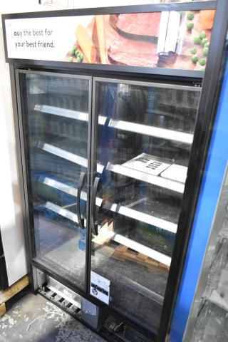 2021 True TVM-48SL-HC commercial 2-door reach-in cooler, black frame, glass doors, 115V, 1 phase, clean condition.